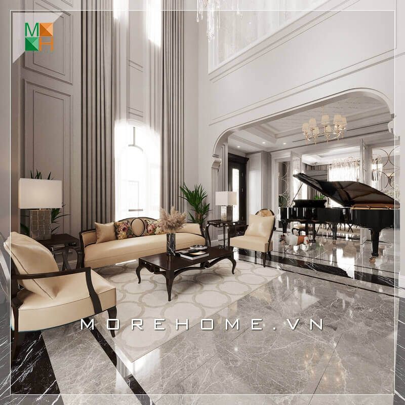KTS đã thể hiện sự tinh tế và sáng tạo của mình bằng cách đặt một cây đàn piano có cùng tone màu với bộ bàn ghế sofa óc chó trong không gian phòng khách, đó là một điểm nhấn độc đáo giúp tạo nên một không gian phòng khách lý tưởng.