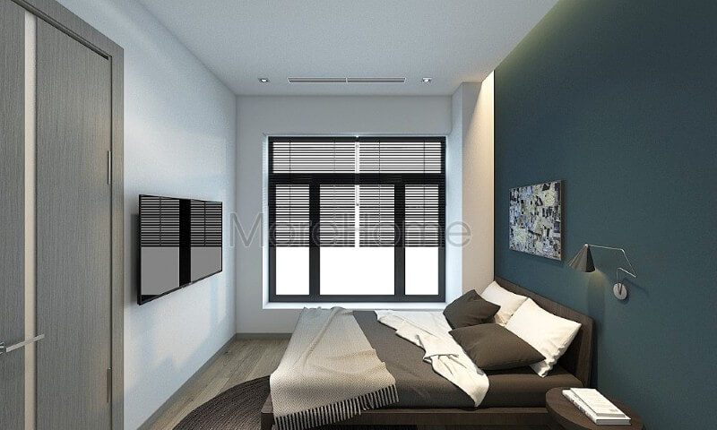 Để tạo điểm nhấn ấn tượng cho không gian phòng ngủ nhỏ, bố trí nội thất đơn giản và dán giấy dán tường màu xanh lạ mắt lên phần vách tường đầu giường.