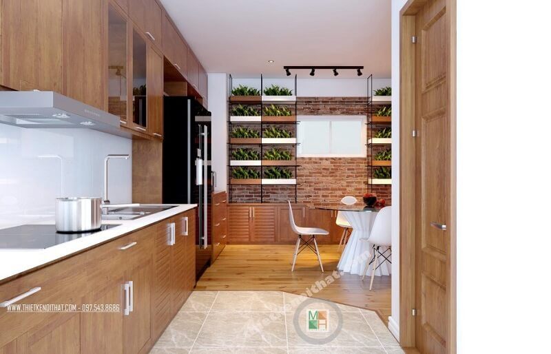 Tủ bếp gỗ được thiết kế đơn giản, hiện đại và có thể kéo dài để tạo ra sự thoáng đãng trong không gian và cũng rất tiện dụng.